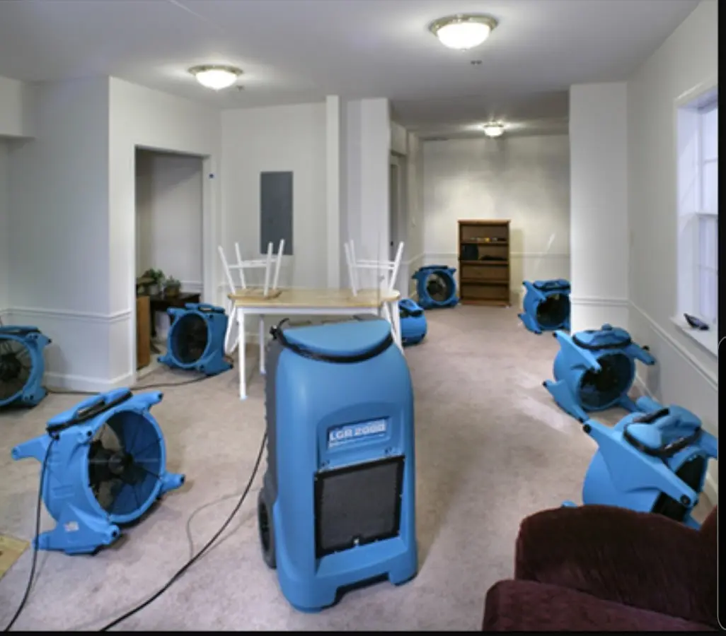Air movers and dehumidifier setup for Water Damage Restoration in Spring Arbor